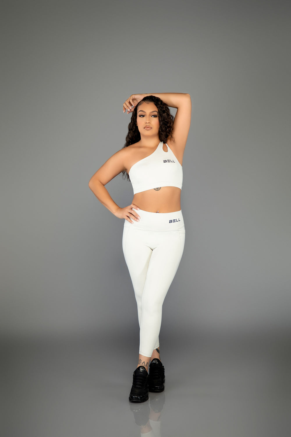 white gym leggings and sports bra set side view athletic wear